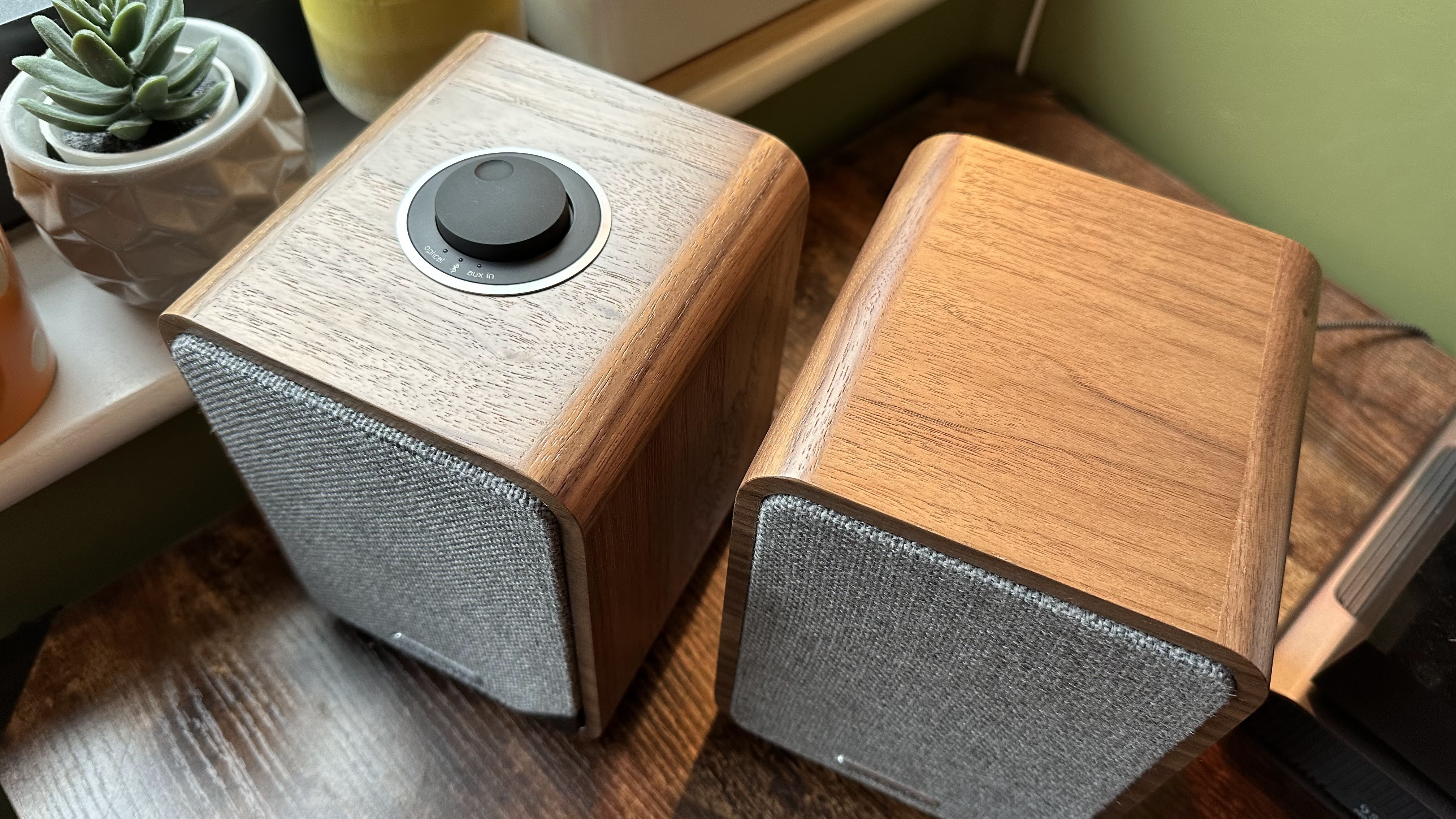 The Ruark Audio MR1 Mk2 speakers on a wooden desk.